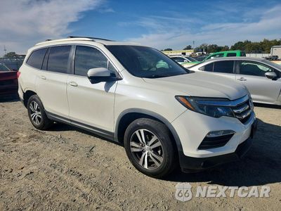 Czwarte zdjęcie samochodu z boku: 2018 HONDA PILOT EXLN VIN:5FNYF6H73JB059102 - miniatura