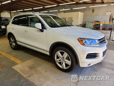 Czwarte zdjęcie samochodu z boku: 2014 VOLKSWAGEN TOUAREG V6 TDI VIN:WVGEP9BPXED010286 - miniatura