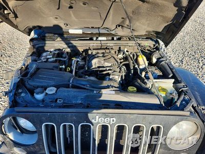 Zdjęcie 11 z 12 samochodu: 2016 JEEP WRANGLER UNLIMITED SAHARA VIN:1C4HJWEG2GL158857 - miniatura
