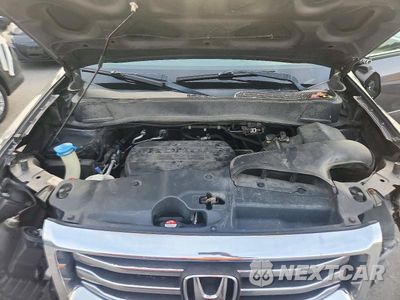 Zdjęcie 12 z 13 samochodu: 2014 HONDA PILOT EXL VIN:5FNYF4H51EB044848 - miniatura