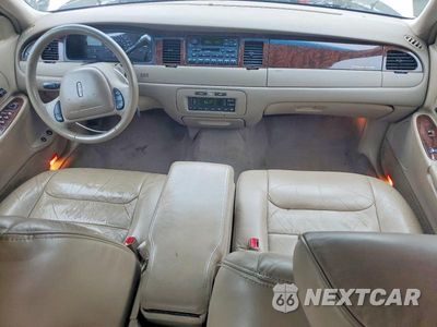 Zdjęcie 8 z 12 samochodu: 2000 LINCOLN TOWN CAR EXECUTIVE VIN:1LNHM81W9YY869911 - miniatura