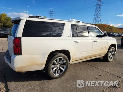 Trzecie zdjęcie samochodu z tyłu: 2016 CHEVROLET SUBURBAN K1500 LTZ VIN:1GNSKJKC0GR131863 - miniatura
