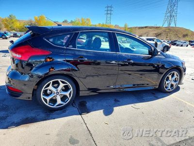 Trzecie zdjęcie samochodu z tyłu: 2017 FORD FOCUS ST VIN:1FADP3L96HL284503 - miniatura