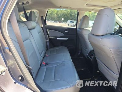 Zdjęcie 11 z 13 samochodu: 2015 HONDA CR-V EXL VIN:2HKRM3H71FH541908 - miniatura