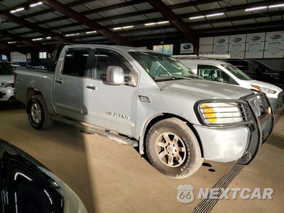 Czwarte zdjęcie samochodu z boku: 2005 NISSAN TITAN XE VIN:1N6AA07B75N507073 - miniatura