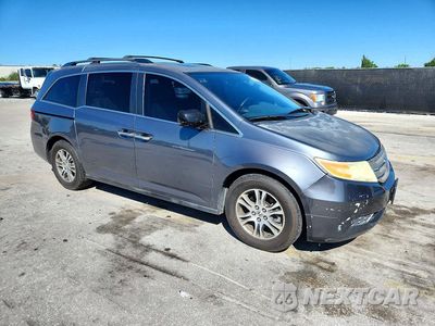 Czwarte zdjęcie samochodu z boku: 2011 HONDA ODYSSEY EXL VIN:5FNRL5H62BB042517 - miniatura