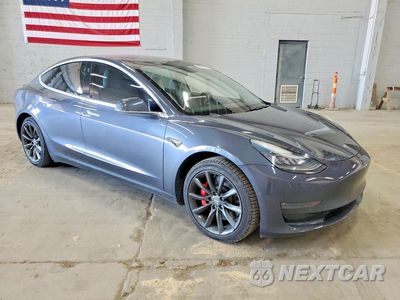 Czwarte zdjęcie samochodu z boku: 2020 TESLA MODEL 3 VIN:5YJ3E1EC6LF641764 - miniatura