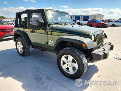 Czwarte zdjęcie samochodu z boku: 2009 JEEP WRANGLER X VIN:1J4FA24109L747433 - miniatura
