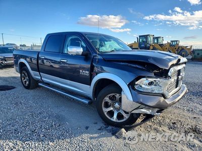 Czwarte zdjęcie samochodu z boku: 2016 RAM 1500 LARAMIE VIN:1C6RR7VM4GS178808 - miniatura