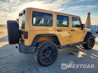 Trzecie zdjęcie samochodu z tyłu: 2014 JEEP WRANGLER UNLIMITED SAHARA VIN:1C4BJWEG5EL110854 - miniatura