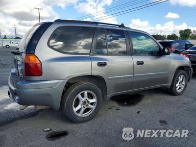 Trzecie zdjęcie samochodu z tyłu: 2007 GMC ENVOY VIN:1GKDS13S672211219 - miniatura