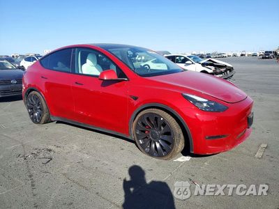 Czwarte zdjęcie samochodu z boku: 2022 TESLA MODEL Y VIN:7SAYGDEF5NF456493 - miniatura