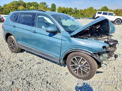Czwarte zdjęcie samochodu z boku: 2021 VOLKSWAGEN TIGUAN SE VIN:3VV2B7AX4MM060603 - miniatura