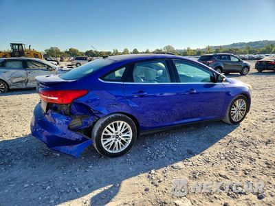 Trzecie zdjęcie samochodu z tyłu: 2015 FORD FOCUS TITANIUM VIN:1FADP3J2XFL323998 - miniatura