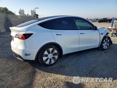 Trzecie zdjęcie samochodu z tyłu: 2021 TESLA MODEL Y VIN:5YJYGDEE2MF090592 - miniatura