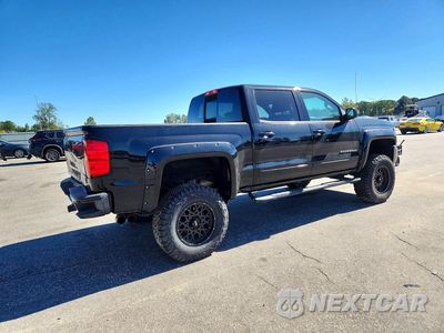 Trzecie zdjęcie samochodu z tyłu: 2018 CHEVROLET SILVERADO K1500 LT VIN:3GCUKREC7JG528991 - miniatura