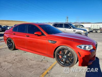 Czwarte zdjęcie samochodu z boku: 2014 BMW M5 VIN:WBSFV9C58ED593428 - miniatura