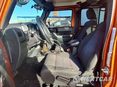 Zdjęcie 7 z 13 samochodu: 2011 JEEP WRANGLER UNLIMITED SAHARA VIN:1J4BA5H13BL604184 - miniatura