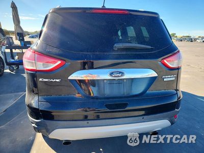 Zdjęcie 6 z 14 samochodu: 2016 FORD ESCAPE TITANIUM VIN:1FMCU0J97GUC78388 - miniatura