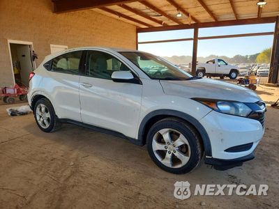 Czwarte zdjęcie samochodu z boku: 2016 HONDA HR-V LX VIN:3CZRU5H33GM700796 - miniatura