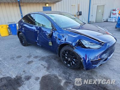 Czwarte zdjęcie samochodu z boku: 2022 TESLA MODEL Y VIN:7SAYGDEE7NF365510 - miniatura