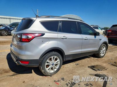 Trzecie zdjęcie samochodu z tyłu: 2018 FORD ESCAPE SEL VIN:1FMCU9HD1JUC70454 - miniatura