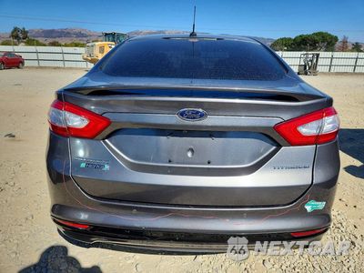 Zdjęcie 6 z 13 samochodu: 2013 FORD FUSION TITANIUM PHEV VIN:3FA6P0SU0DR332425 - miniatura