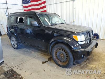 Czwarte zdjęcie samochodu z boku: 2007 DODGE NITRO R/T VIN:1D8GU58607W737460 - miniatura