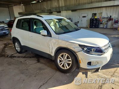Czwarte zdjęcie samochodu z boku: 2017 VOLKSWAGEN TIGUAN S VIN:WVGBV7AX9HW512973 - miniatura