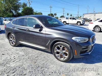 Czwarte zdjęcie samochodu z boku: 2021 BMW X4 XDRIVE30I VIN:5UX2V1C09M9G72346 - miniatura