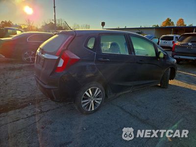 Trzecie zdjęcie samochodu z tyłu: 2017 HONDA FIT EX VIN:3HGGK5G74HM707749 - miniatura