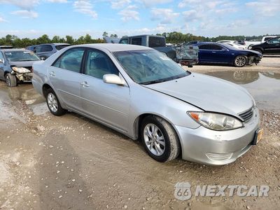 Czwarte zdjęcie samochodu z boku: 2006 TOYOTA CAMRY LE V6 VIN:4T1BF32K16U111385 - miniatura
