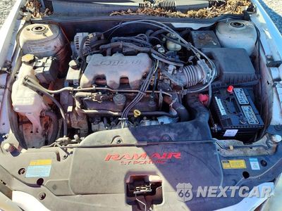 Zdjęcie 11 z 12 samochodu: 2001 PONTIAC GRAND AM GT1 VIN:1G2NV12E31M621690 - miniatura