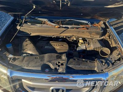 Zdjęcie 12 z 13 samochodu: 2010 HONDA PILOT EXL VIN:5FNYF3H57AB007193 - miniatura