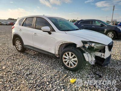 Czwarte zdjęcie samochodu z boku: 2014 MAZDA CX-5 TOURING VIN:JM3KE2CY5E0381320 - miniatura