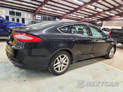 Trzecie zdjęcie samochodu z tyłu: 2014 FORD FUSION SE VIN:1FA6P0H77E5388111 - miniatura