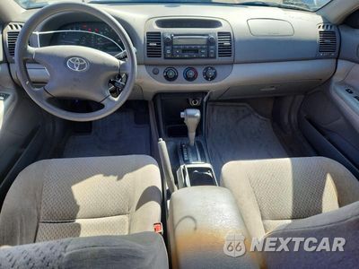 Zdjęcie 8 z 12 samochodu: 2003 TOYOTA CAMRY LE VIN:JTDBE32K430153690 - miniatura