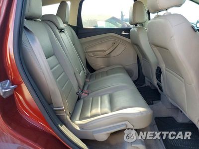 Zdjęcie 11 z 13 samochodu: 2014 FORD ESCAPE TITANIUM VIN:1FMCU0J94EUB61087 - miniatura