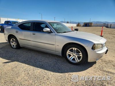 Czwarte zdjęcie samochodu z boku: 2010 DODGE CHARGER SXT VIN:2B3CA3CV6AH230837 - miniatura