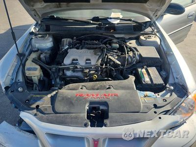 Zdjęcie 11 z 12 samochodu: 2004 PONTIAC GRAND AM GT VIN:1G2NW52E54C121416 - miniatura