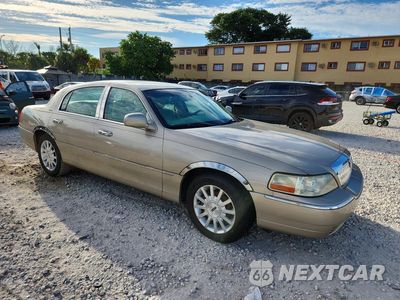 Czwarte zdjęcie samochodu z boku: 2006 LINCOLN TOWN CAR SIGNATURE VIN:1LNHM81W26Y644422 - miniatura
