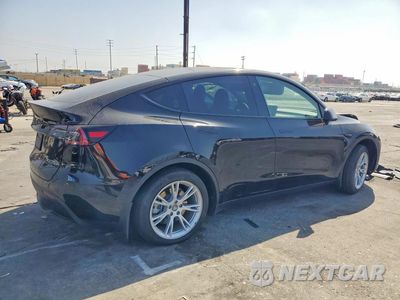 Trzecie zdjęcie samochodu z tyłu: 2023 TESLA MODEL Y VIN:7SAYGDEE8PA113880 - miniatura