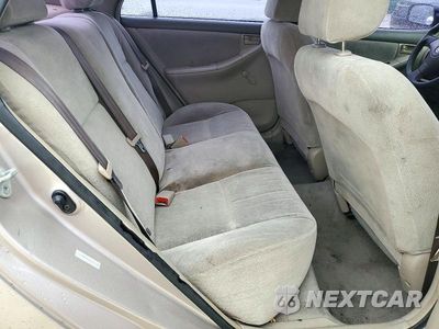 Zdjęcie 10 z 13 samochodu: 2003 TOYOTA COROLLA CE VIN:1NXBR32E43Z167270 - miniatura