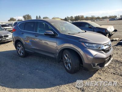Czwarte zdjęcie samochodu z boku: 2018 HONDA CR-V EXL VIN:7FARW1H81JE017385 - miniatura