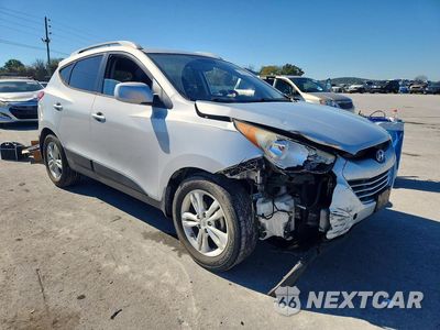 Czwarte zdjęcie samochodu z boku: 2011 HYUNDAI TUCSON GLS VIN:KM8JU3AC3BU151067 - miniatura