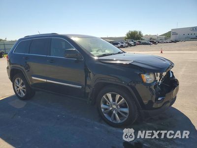 Czwarte zdjęcie samochodu z boku: 2012 JEEP GRAND CHEROKEE LAREDO VIN:1C4RJFAG4CC281239 - miniatura