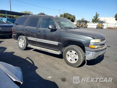 Czwarte zdjęcie samochodu z boku: 2004 CHEVROLET TAHOE K1500 VIN:1GNEK13T34R166596 - miniatura