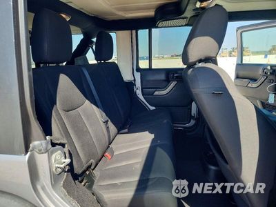 Zdjęcie 10 z 13 samochodu: 2018 JEEP WRANGLER UNLIMITED SPORT VIN:1C4HJWDG1JL938499 - miniatura