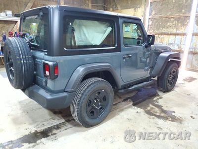 Trzecie zdjęcie samochodu z tyłu: 2026 JEEP WRANGLER SPORT VIN:1C4PJXANXTW274578 - miniatura