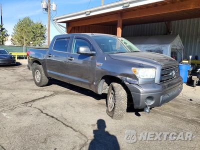 Czwarte zdjęcie samochodu z boku: 2012 TOYOTA TUNDRA CREWMAX SR5 VIN:5TFDY5F13CX257043 - miniatura